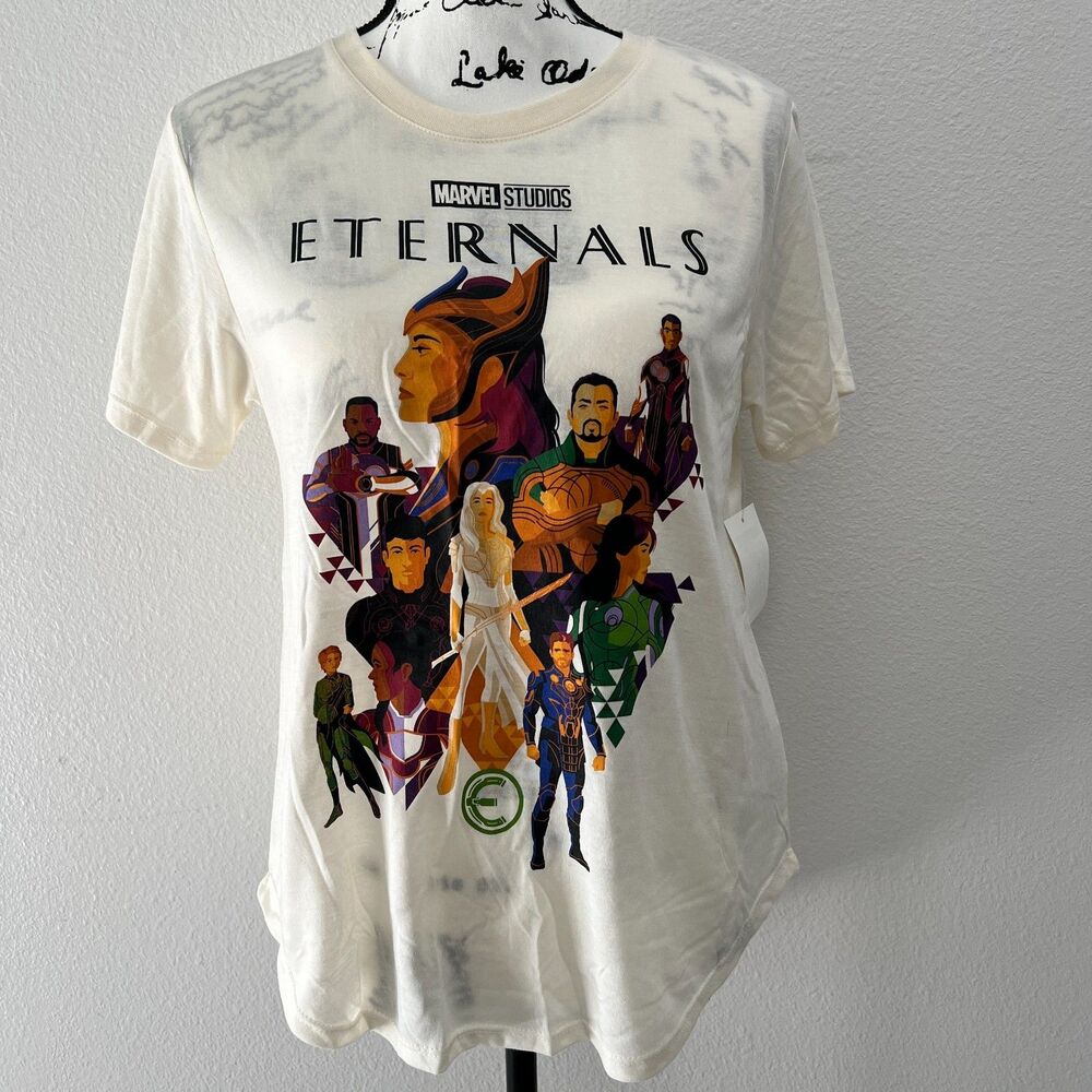 NWT Marvel Studios Eternals (Large) Cream Art Graphic T-Shirt Sersi Ikaris